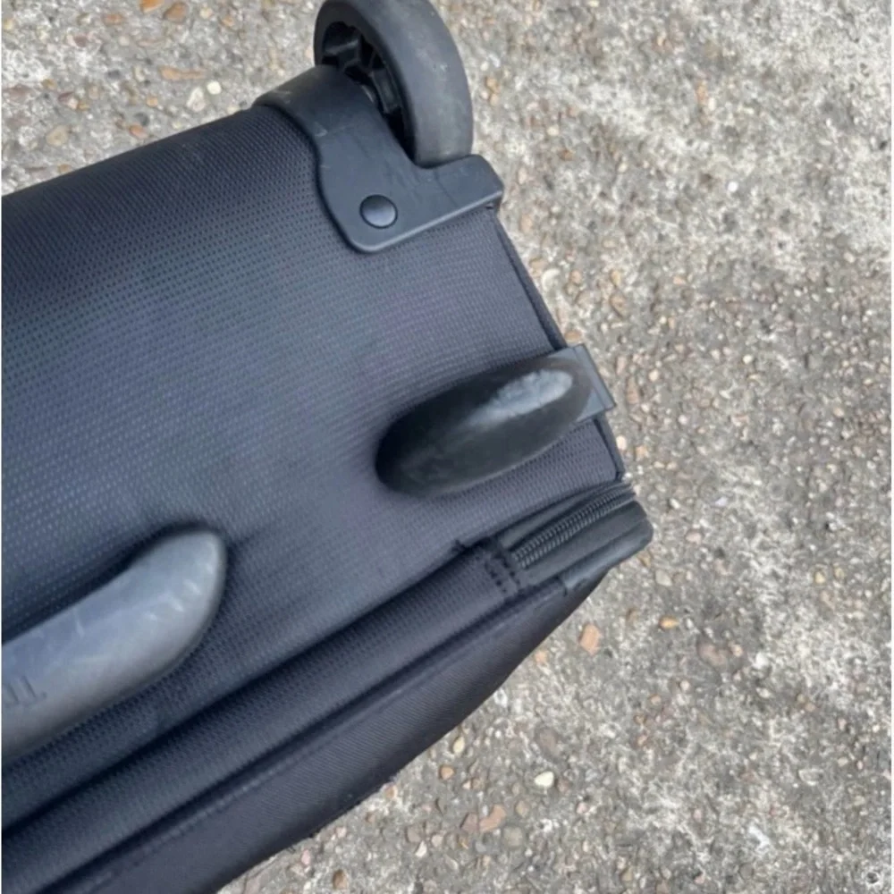 Travelpro Black Soft-Shell Rolling Under-seat Carry-On with Front Pocket